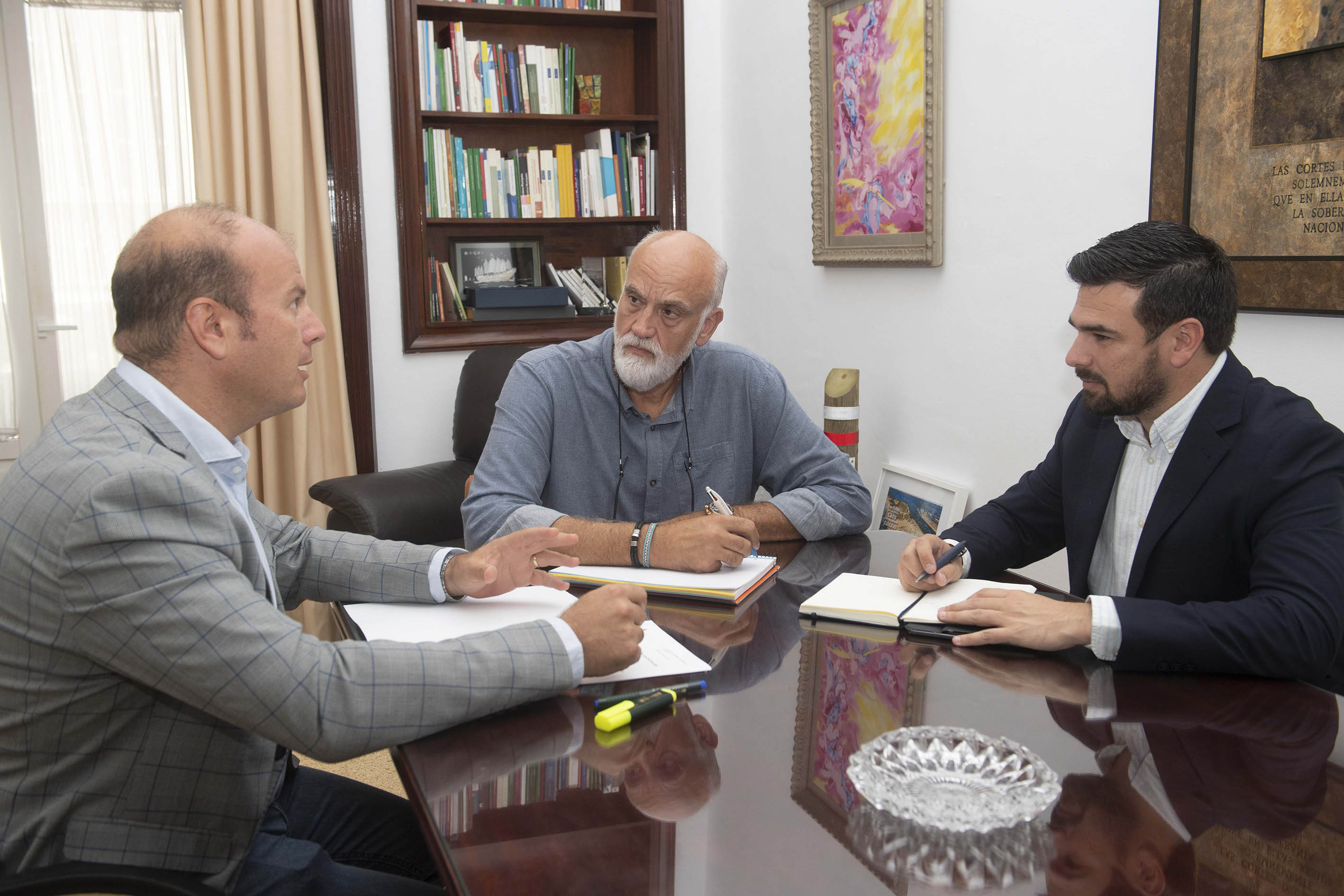 Javier Vidal con los delegados Curtido y Moreno